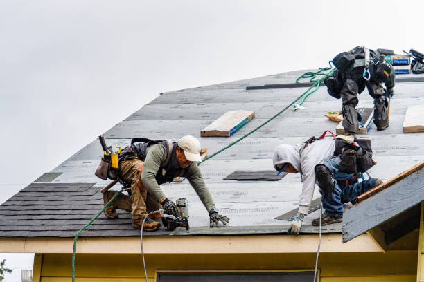 Professional Roofing technician working in Tolland, CT